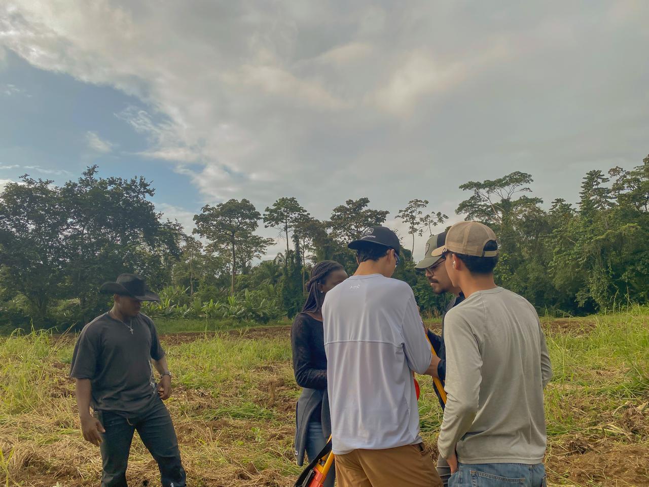 Topographic survey team in the field at EARTH University